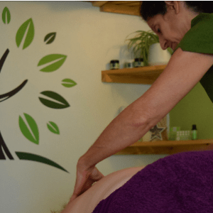 Helen Kremer-Williams performing an Aromatherapy Top to Toe massage at The Olive Branch.